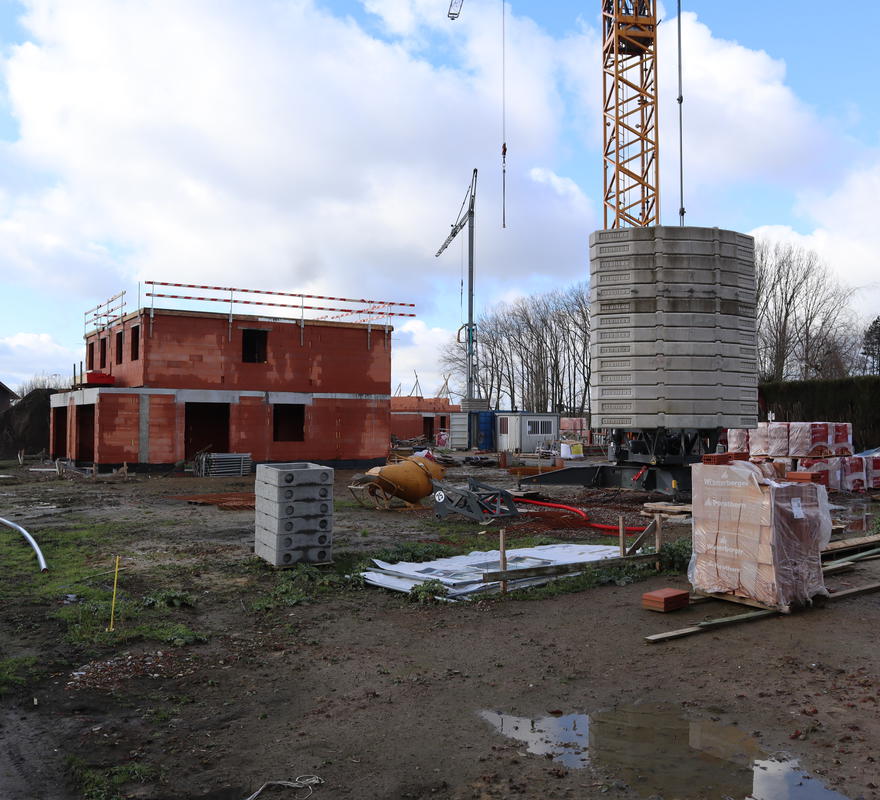 18059 Bouwen van 21 woningen te Pittem